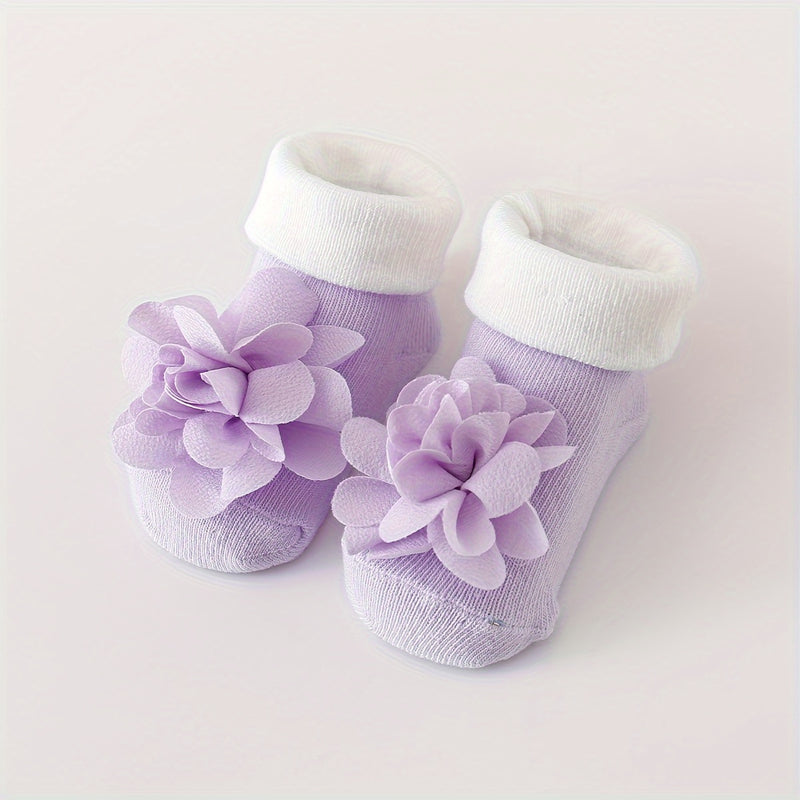 A Set of 1 Pair of Baby Flower Socks Along with a Baby Mesh Headband.