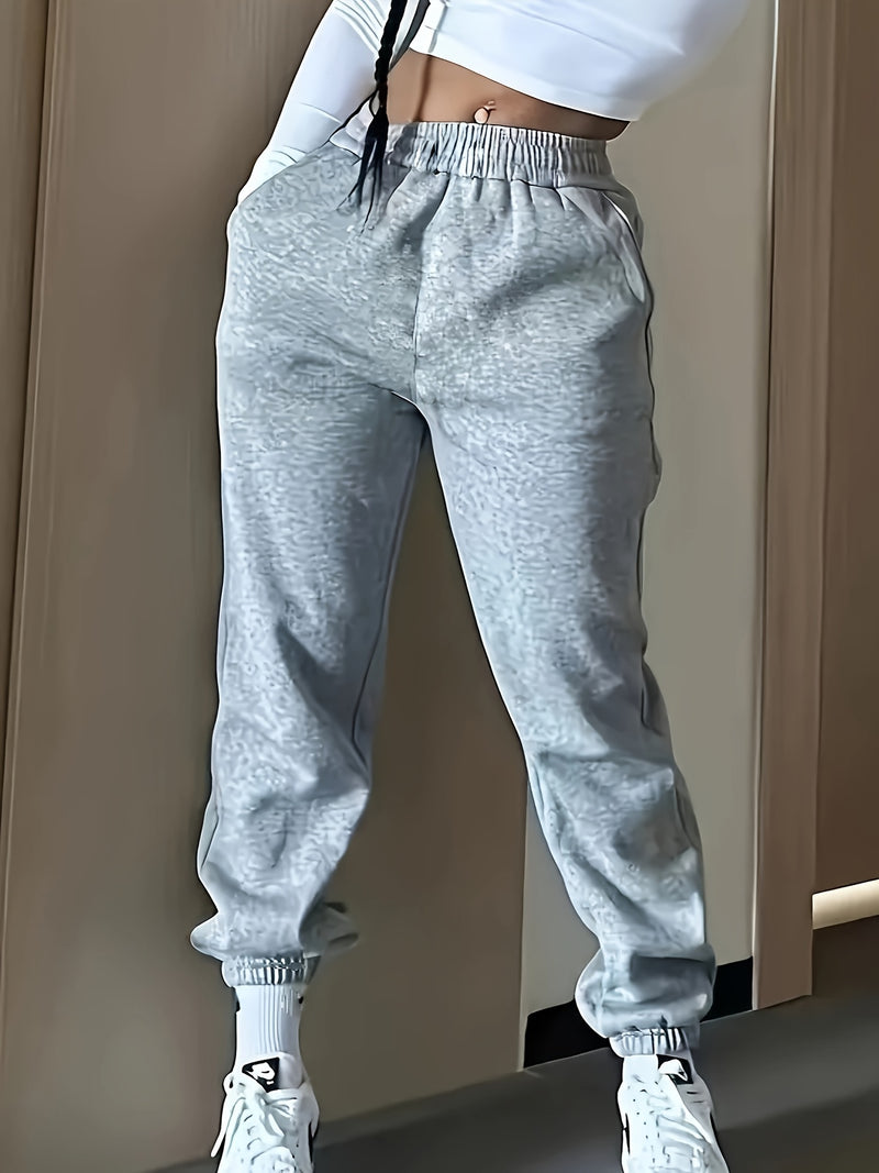High-Waisted Elastic Jogger Pants for Women - 100% Polyester Casual Style.