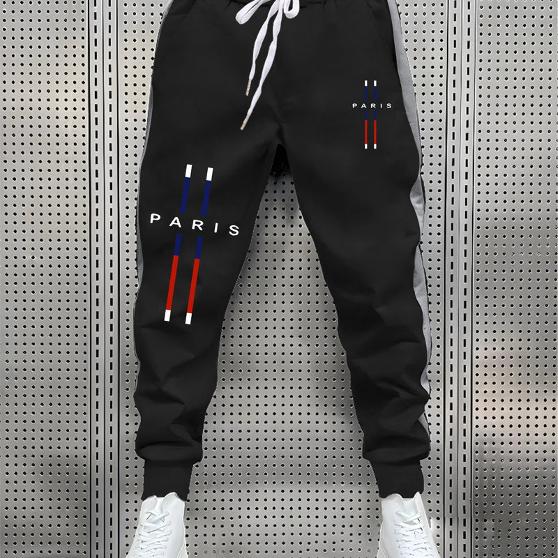 fashionable Men's color blocked drawstring sports pants.