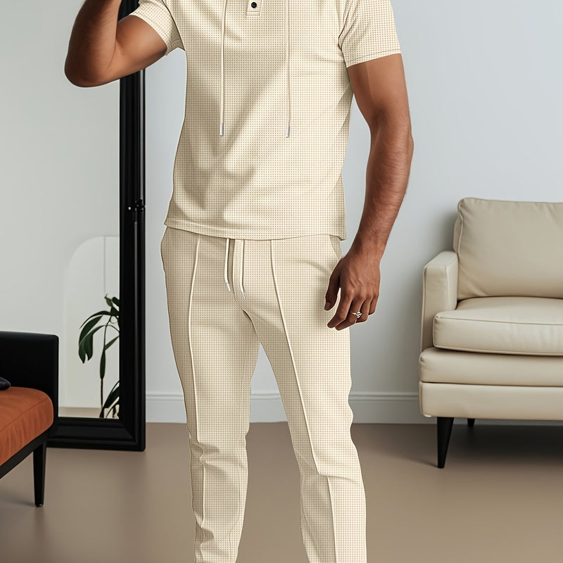 Men's set short sleeved hooded top with drawstring elastic waistband.