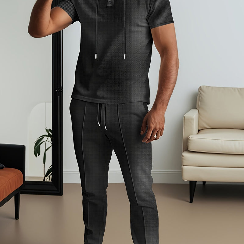 Men's set short sleeved hooded top with drawstring elastic waistband.