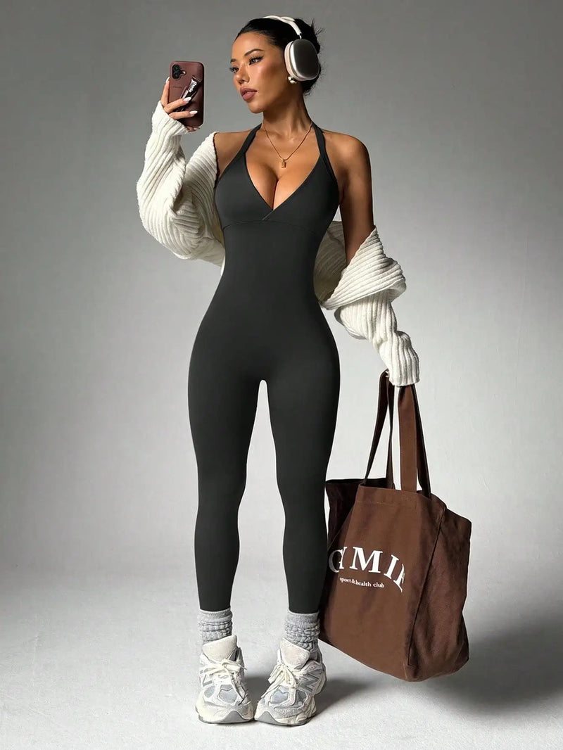 Women's solid color vest style seamless elastic sports jumpsuit.