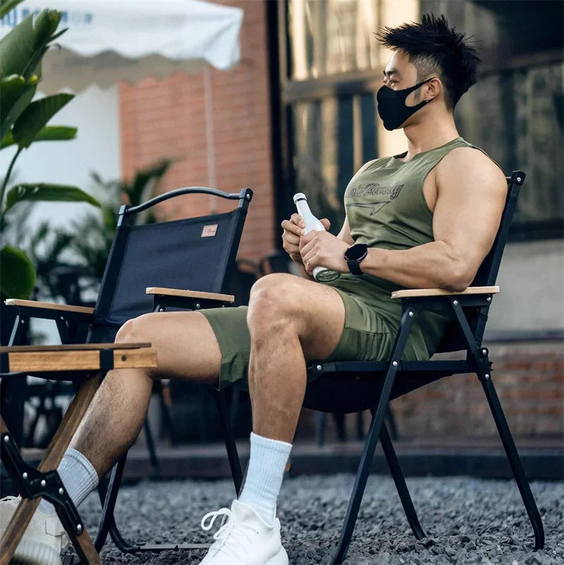 Men’s casual sport suit men running fitness vest+Shorts two-piece set.