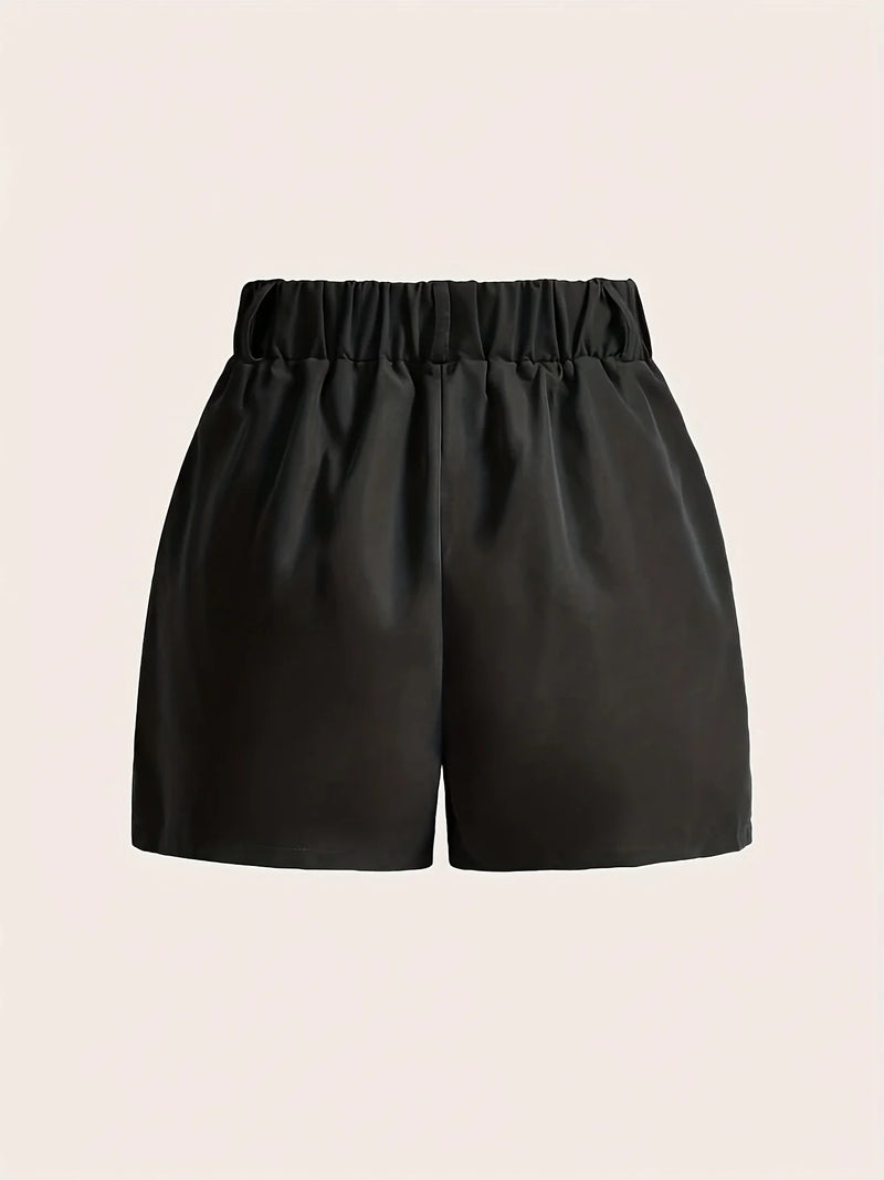 Ladies' casual versatile solid color simple pocket elastic waist shorts.
