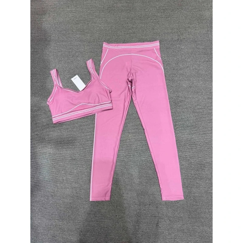 AL* Yoga Set: Striped color-blocked design elongates proportions.