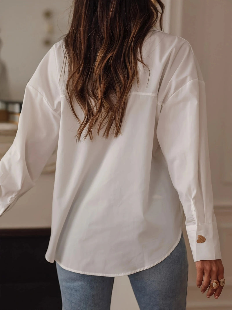 Ladies fashion solid color button-down shirt.