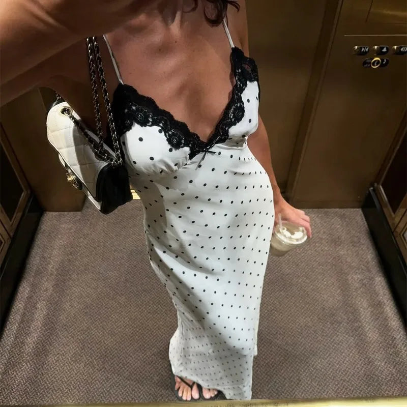 Women's Elegant Retro V-Neck Polka Dot Sleeveless Dress.