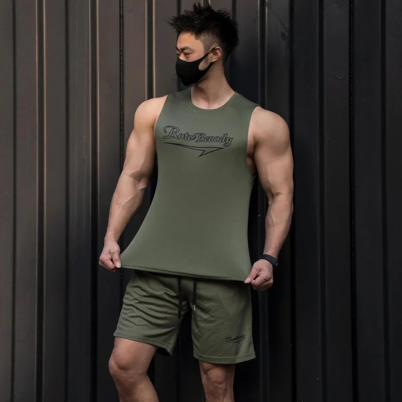 Men’s casual sport suit men running fitness vest+Shorts two-piece set.