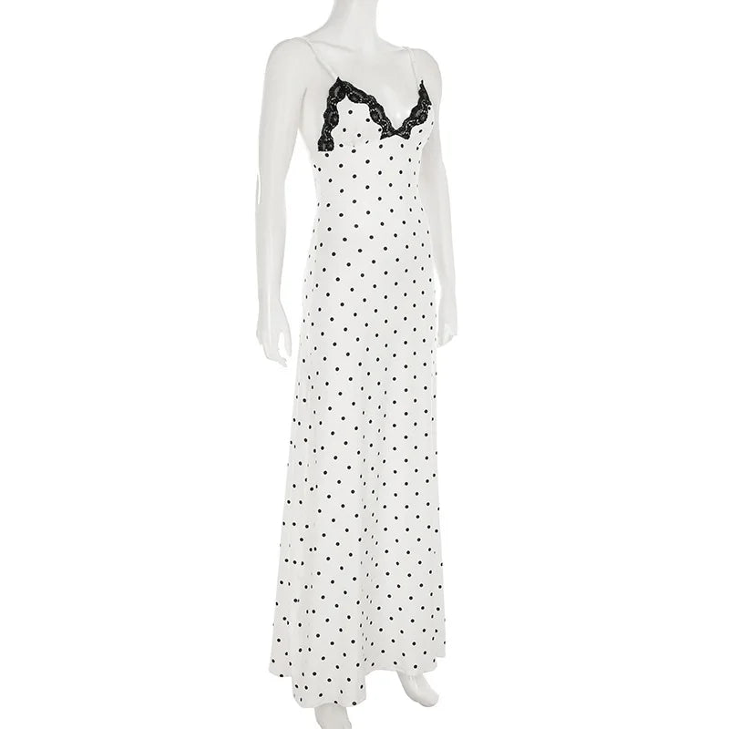 Women's Elegant Retro V-Neck Polka Dot Sleeveless Dress.