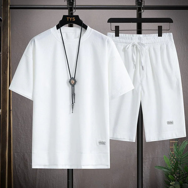 Men's short sleeved T-shirt and sports shorts set casual sportswear.
