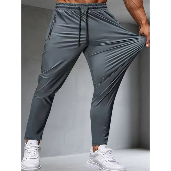 Men's Fitness Pants Zippered Pockets Stretch Sports Pants Running Daily Wear.
