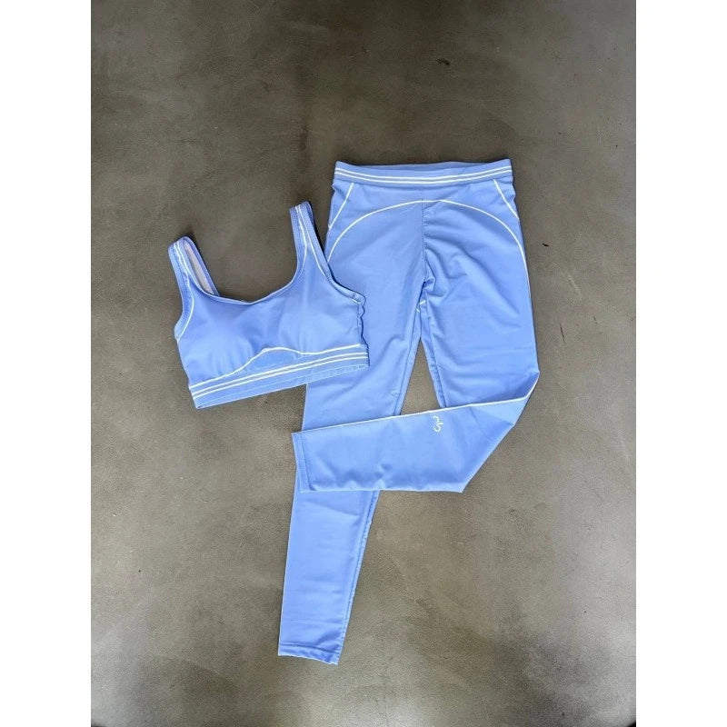 AL* Yoga Set: Striped color-blocked design elongates proportions.