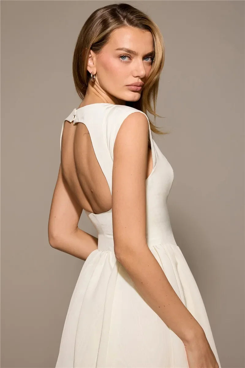 Suninheart Women Circle Cut Out Back Dress Wide Shoulders.