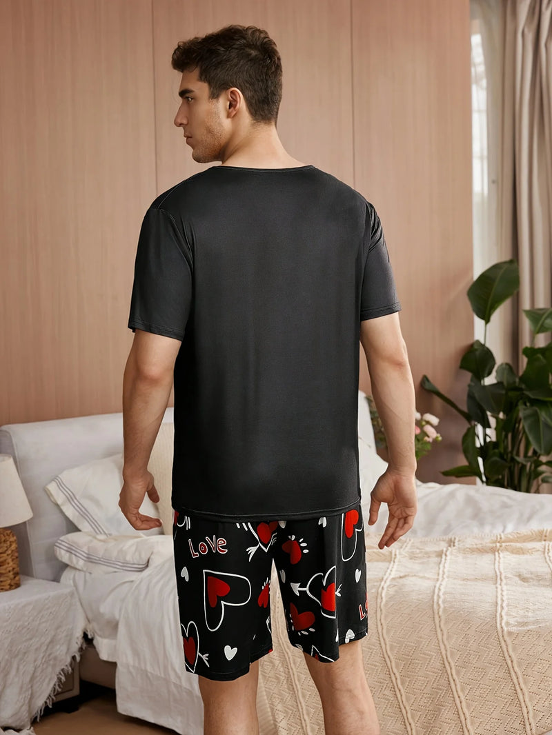 A set of men's clothing, short sleeves and love printed shorts.