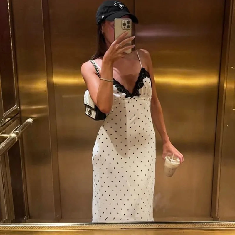 Women's Elegant Retro V-Neck Polka Dot Sleeveless Dress.