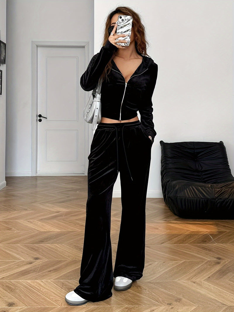 Women’s Black Rhinestone Decorated Hooded Zipper Top and Pocket Pants.