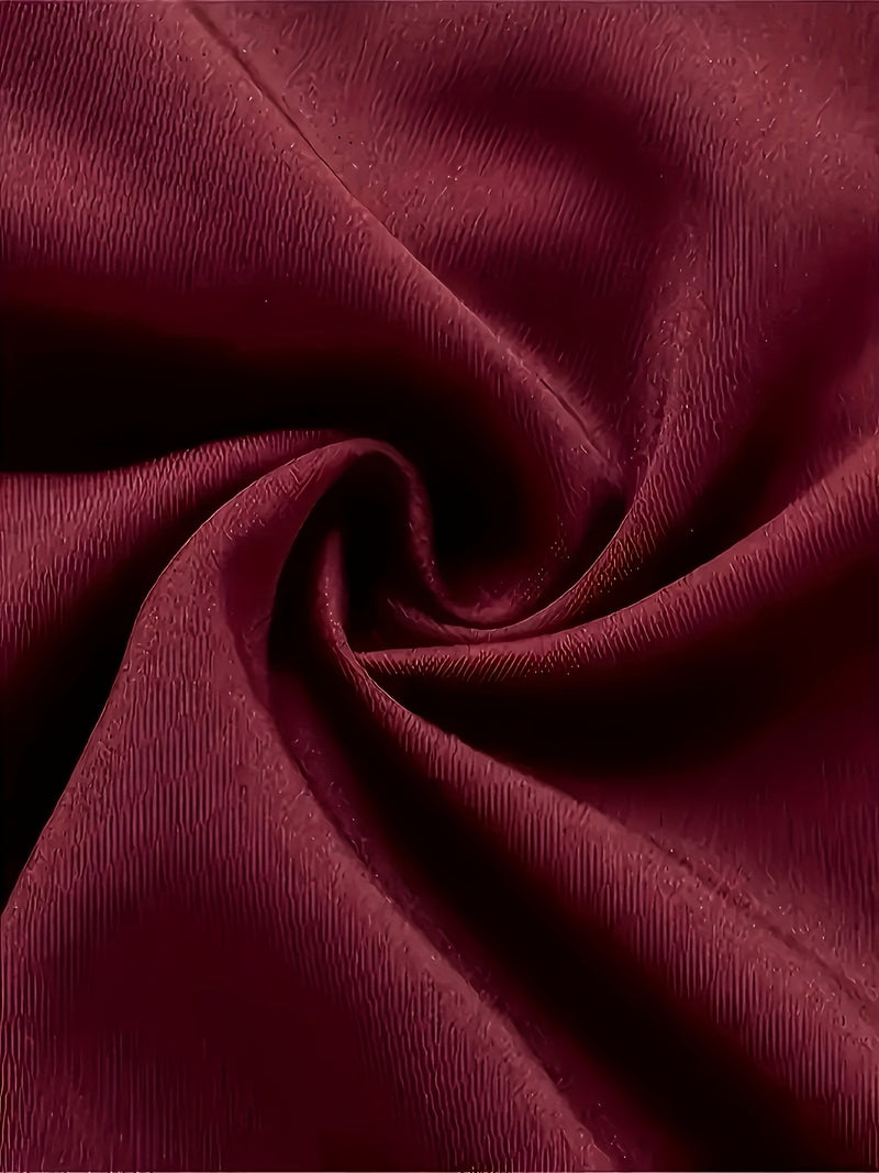 A Men's Three-Piece Suit Consisting of a Blazer, Vest, And Trousers.