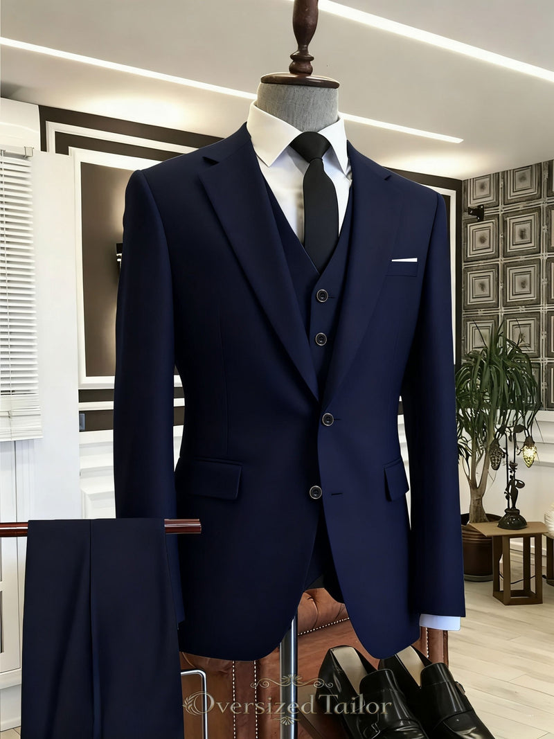 A Men's Three-Piece Suit Consisting of a Blazer.