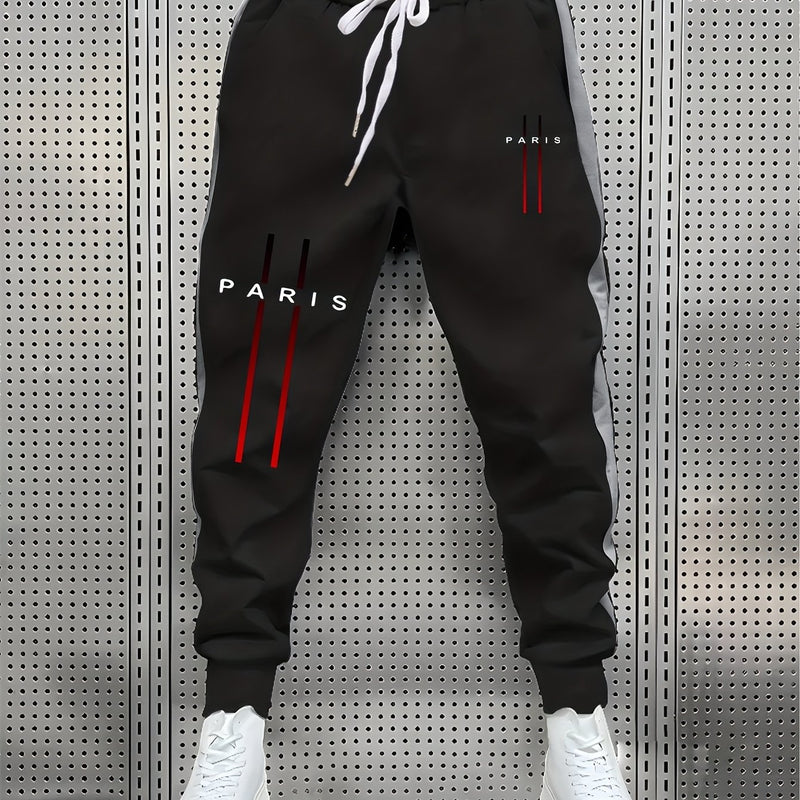 Stylish Men's Color-Blocked Jogger Pants Featuring a Striking Print Design.