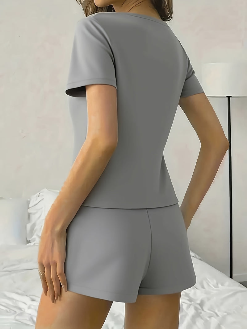 Women's Sporty Two-Piece Set: Round Neck Short Sleeve T-Shirt + Pocketed Shorts.