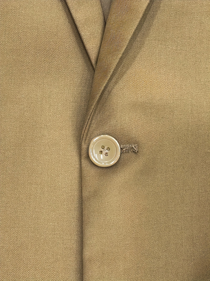 A Men'S Two-Piece Suit Featuring a Easy And Stylish Design.
