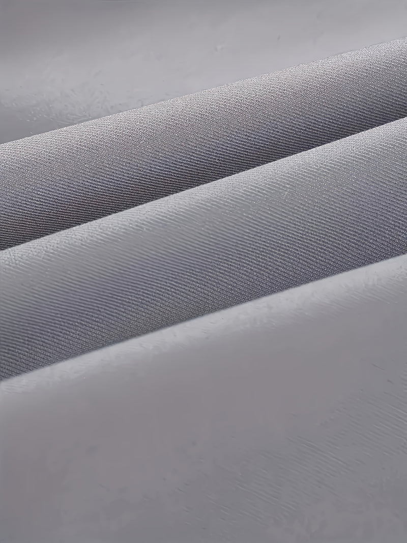 A Men's Three-Piece Suit Consisting of a Blazer, Vest, And Trousers.