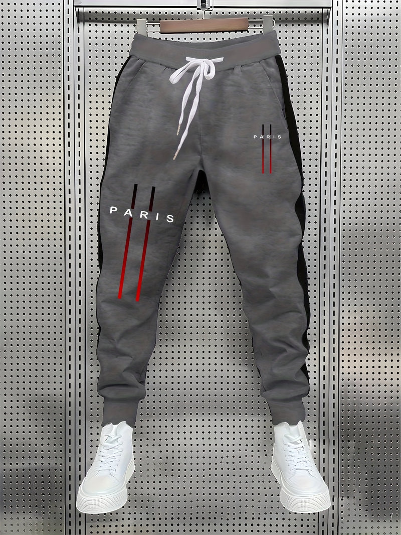 Stylish Men's Color-Blocked Jogger Pants Featuring a Striking Print Design.