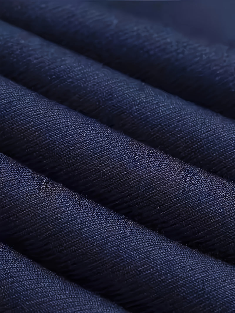 A Men's Three-Piece Suit Consisting of a Blazer, Vest, And Trousers.