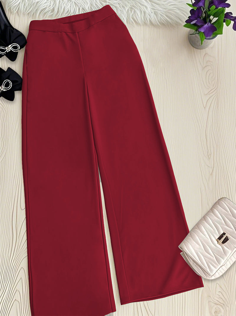 Women’s Two-Piece Set Featuring a Geometric Print Shirt And Solid Color Trousers.