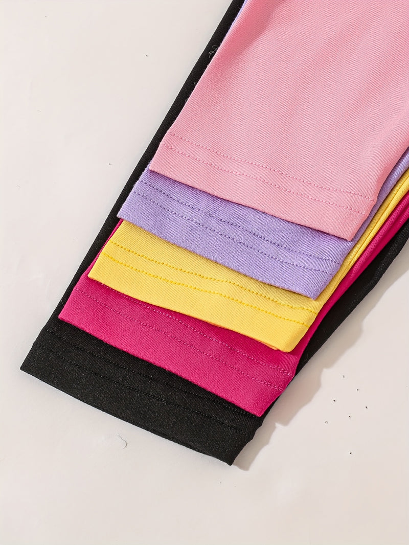 A Set of Five Adorable Hello Kitty Leggings with Bow Prints from Sanrio.