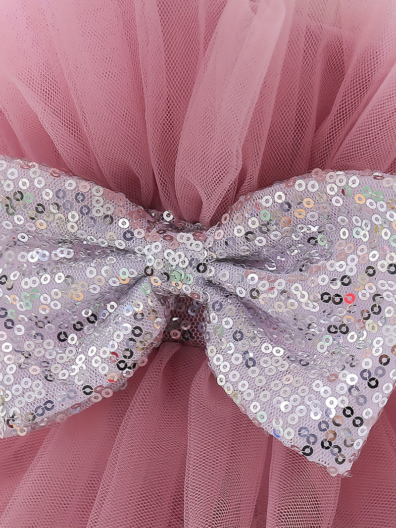 The Girl's Ethereal Puffy Dress, Perfect for a Baby's Birthday Party.