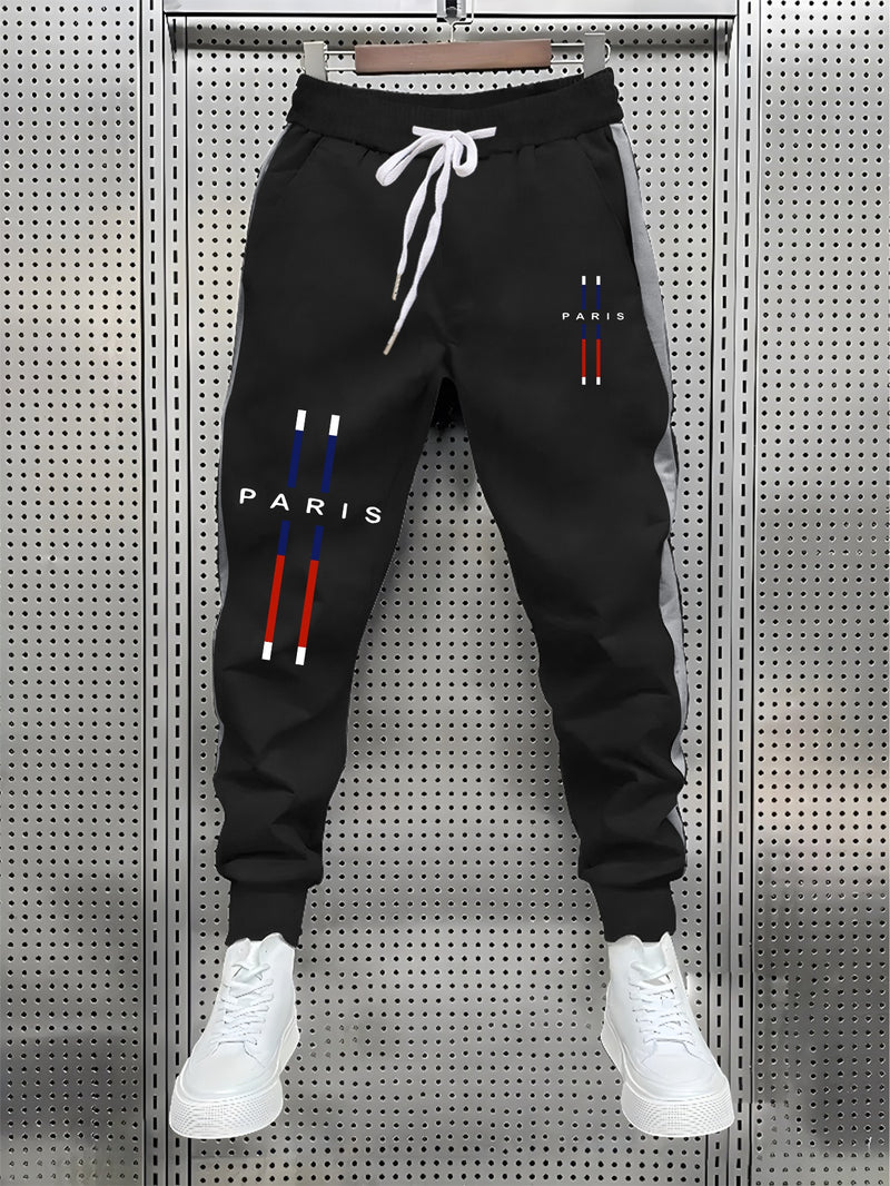 fashionable Men's color blocked drawstring sports pants.
