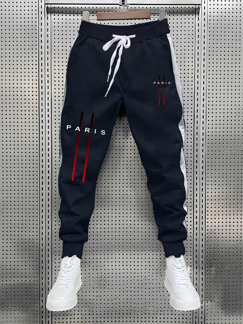 Stylish Men's Color-Blocked Jogger Pants Featuring a Striking Print Design.