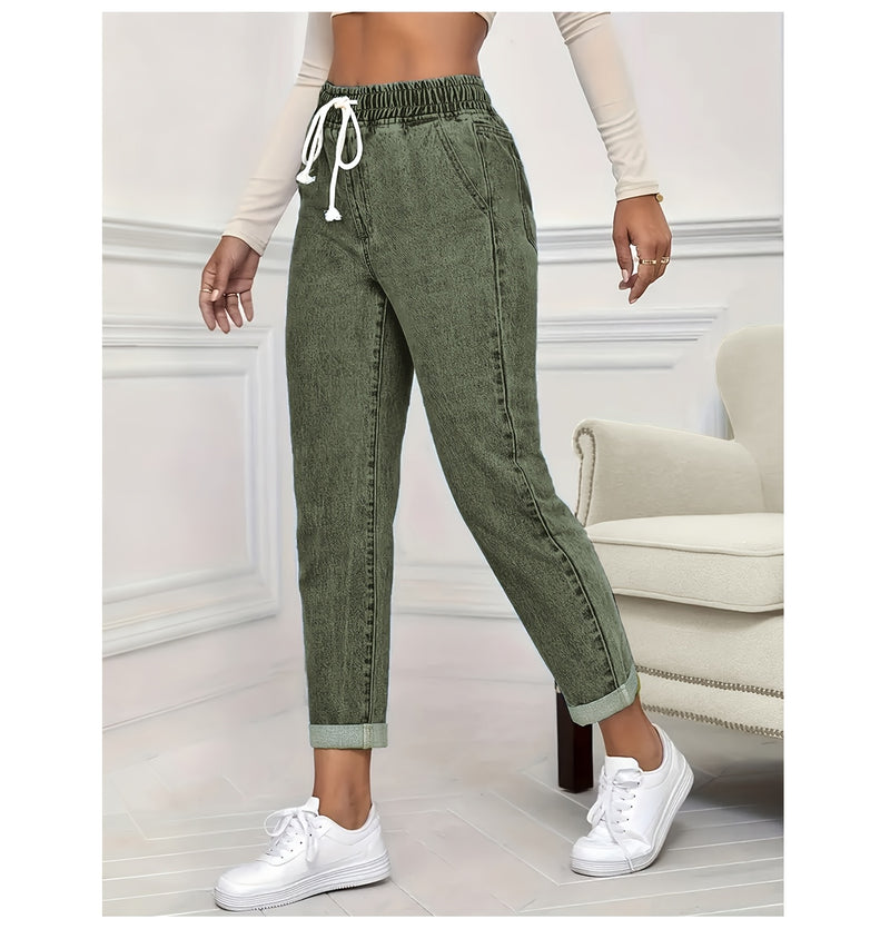 Women's stretch elastic waist drawstring slim fit jeans.