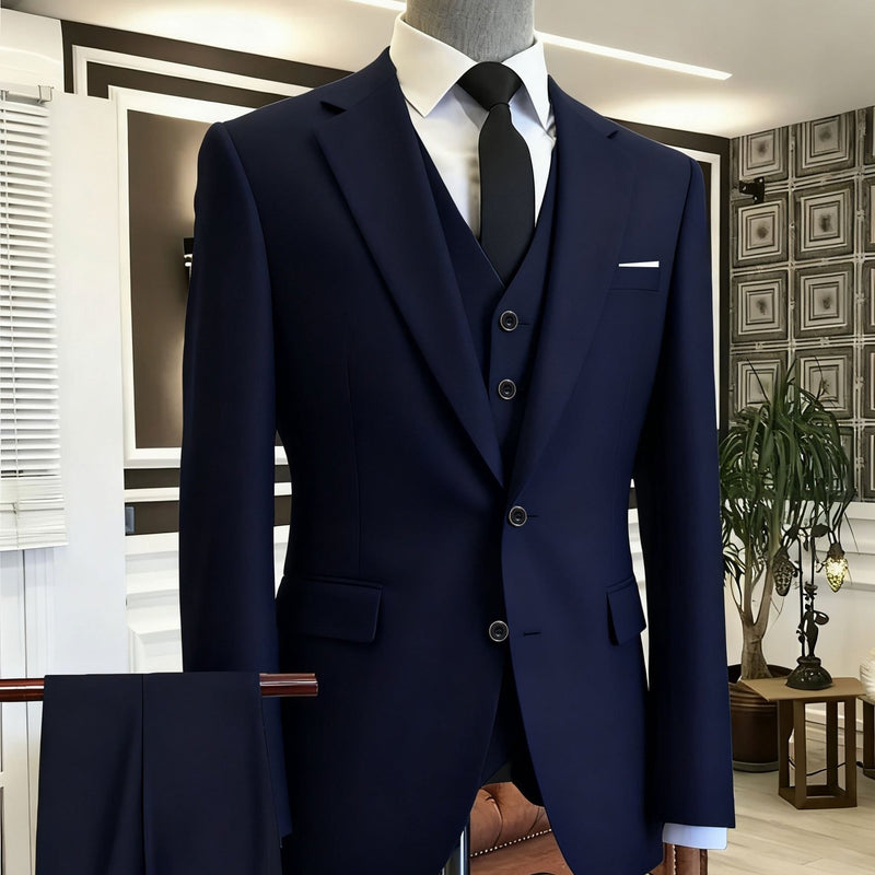 A Men's Three-Piece Suit Consisting of a Blazer.