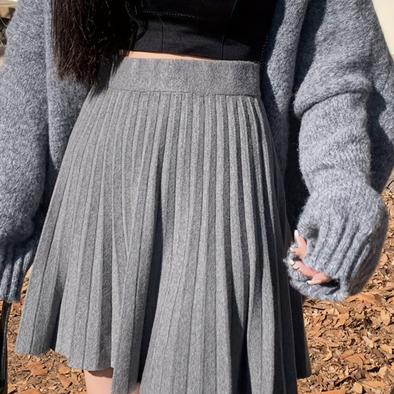 Cute And Playful High-Waisted Pleated Solid Color Mini Skirt.