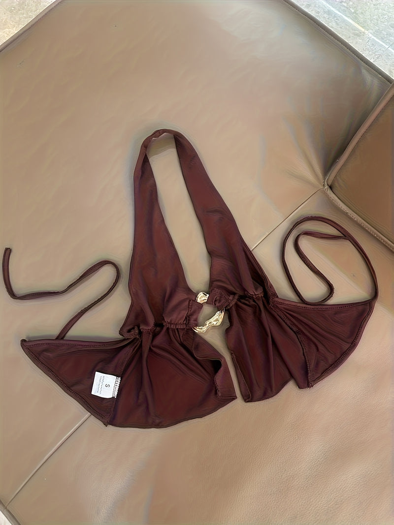 Women’s Featuring a Backless Halter Neck Top with a Unique Metallic Buckle.