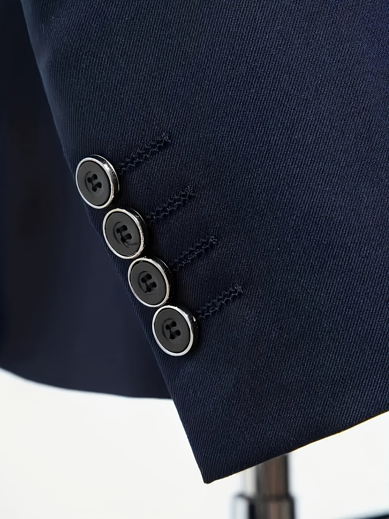 A Men's Three-Piece Suit Consisting of a Blazer, Vest, And Trousers.