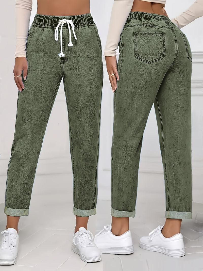 Women's stretch elastic waist drawstring slim fit jeans.