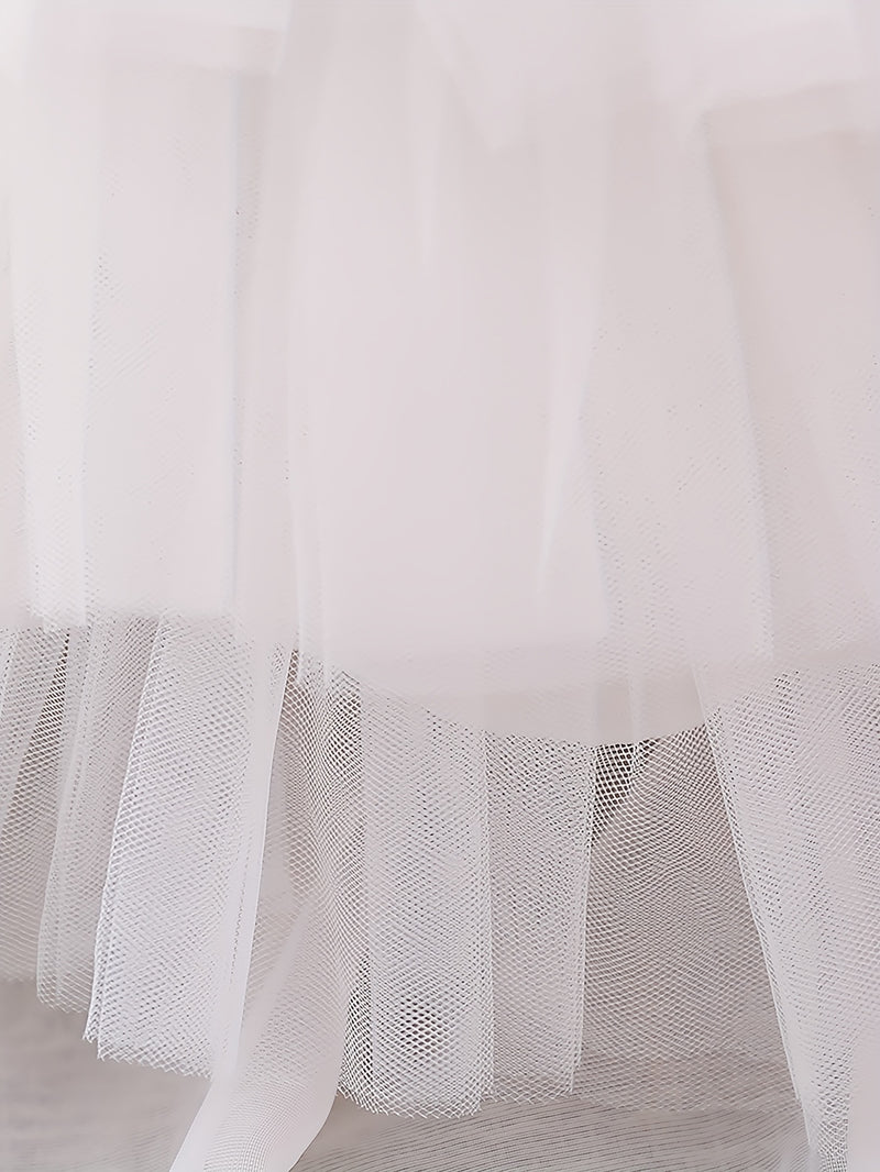 The Girl's Ethereal Puffy Dress, Perfect for a Baby's Birthday Party.
