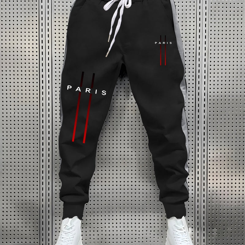 Stylish Men's Color-Blocked Jogger Pants Featuring a Striking Print Design.