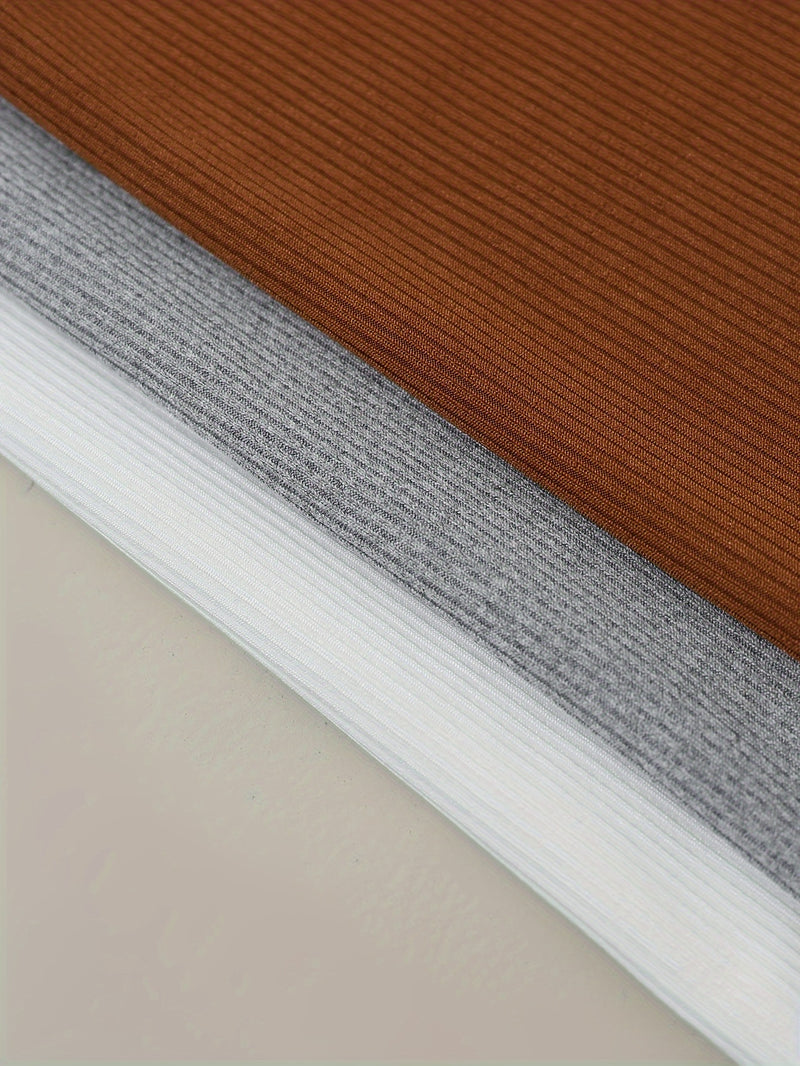 A Set of 3 Different Styles of Tank Tops and Pants for Women.