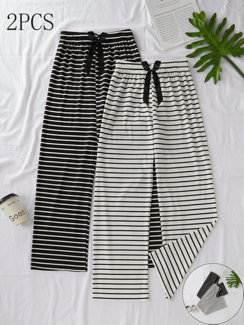 Elegant Women'S Two-Piece Set Featuring a Classic Black And White.