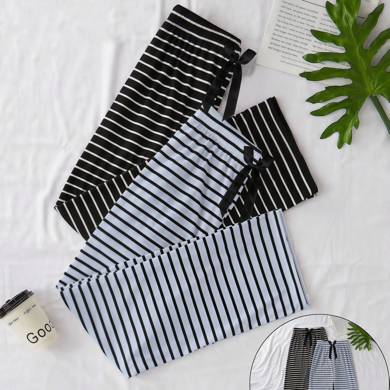 Women's Two-Piece Set Featuring a Classic Black And White Striped Theme.