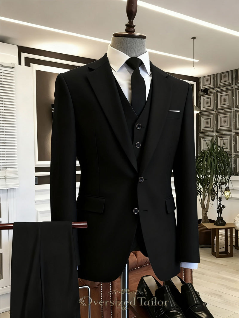 A Men's Three-Piece Suit Consisting of a Blazer.