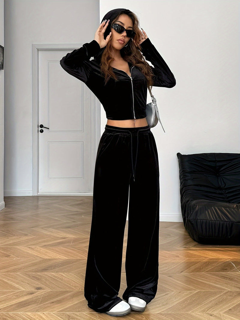 Women’s Black Rhinestone Decorated Hooded Zipper Top and Pocket Pants.