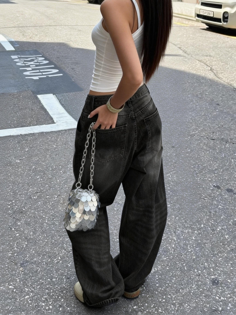 A Pair of Loose-Fitting Black And Gray Wide-Leg Pants for Women.