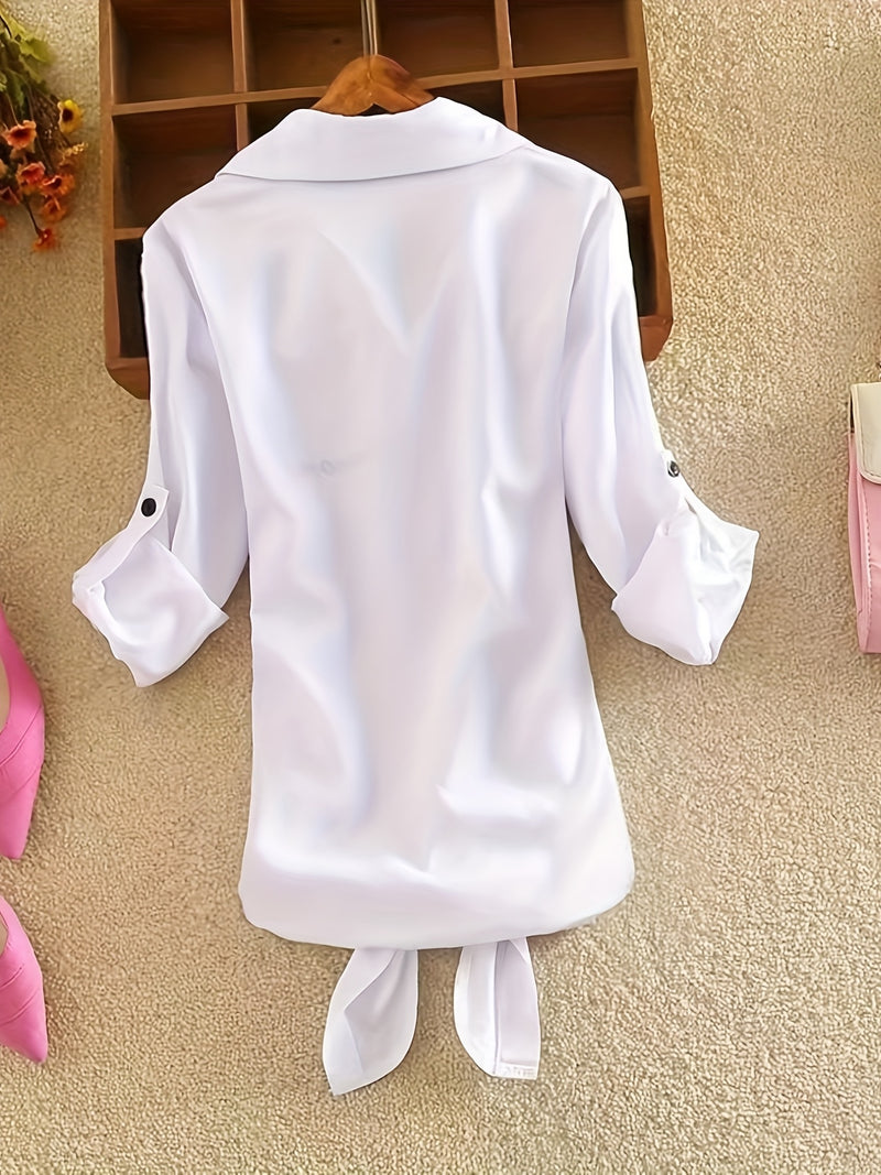 The Lady's Shirt Is White with Black Letters.