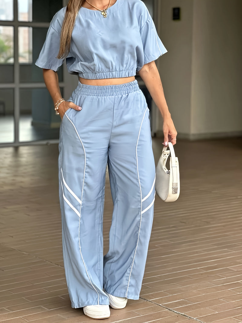 Women’s Trendy Crop Top Paired with Wide-Leg Pants.