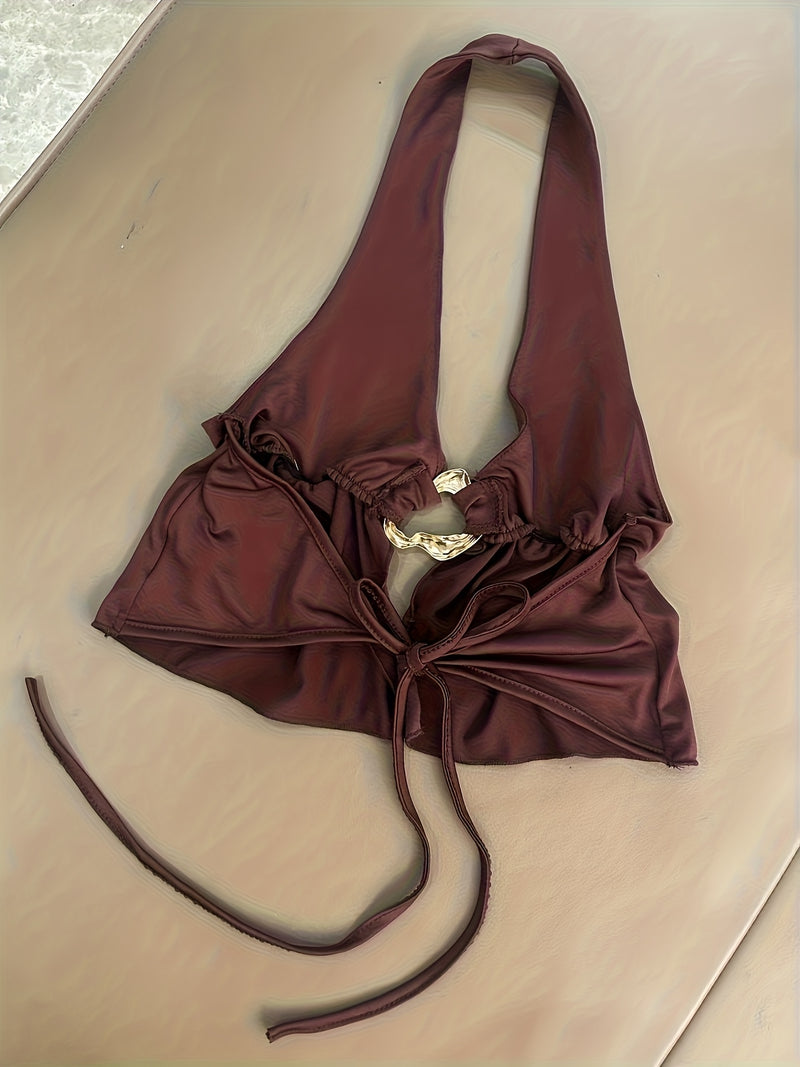 Women’s Featuring a Backless Halter Neck Top with a Unique Metallic Buckle.